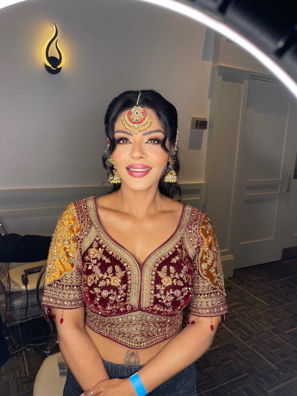 Event glam, maroon-gold, sculpted, joyful
