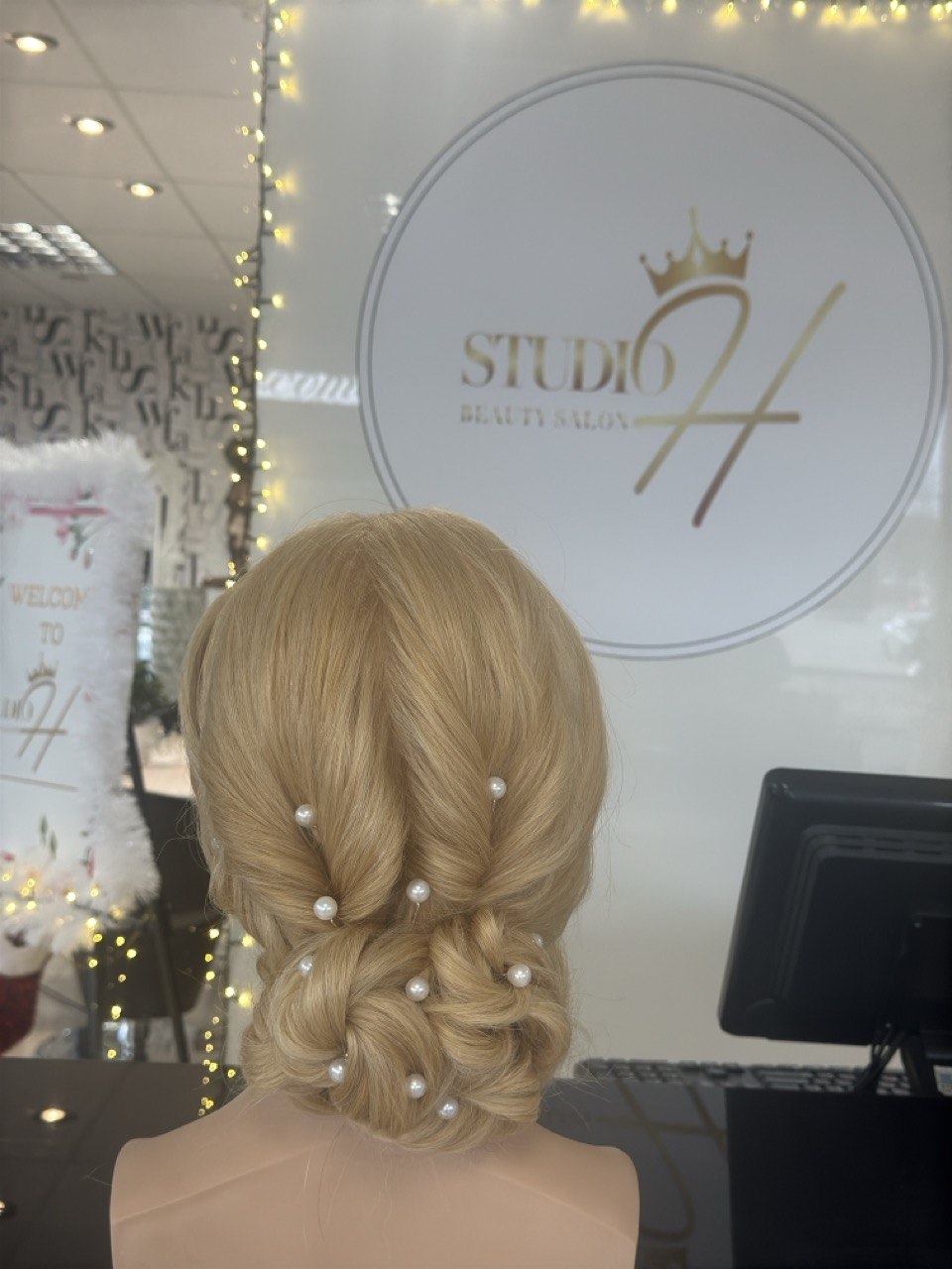 Bridal updo with pearl detail