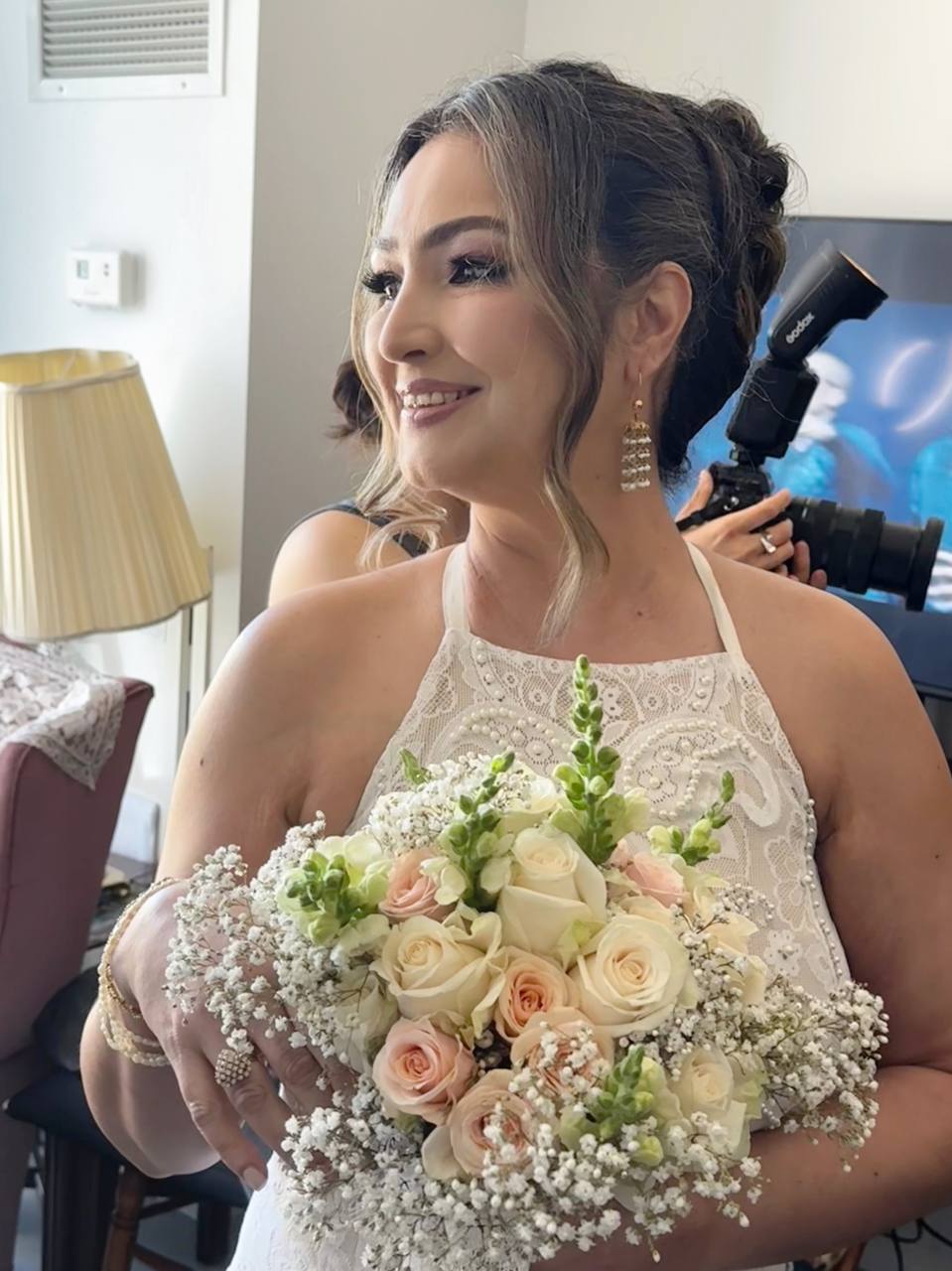 Bride with bouquet, soft glowing skin